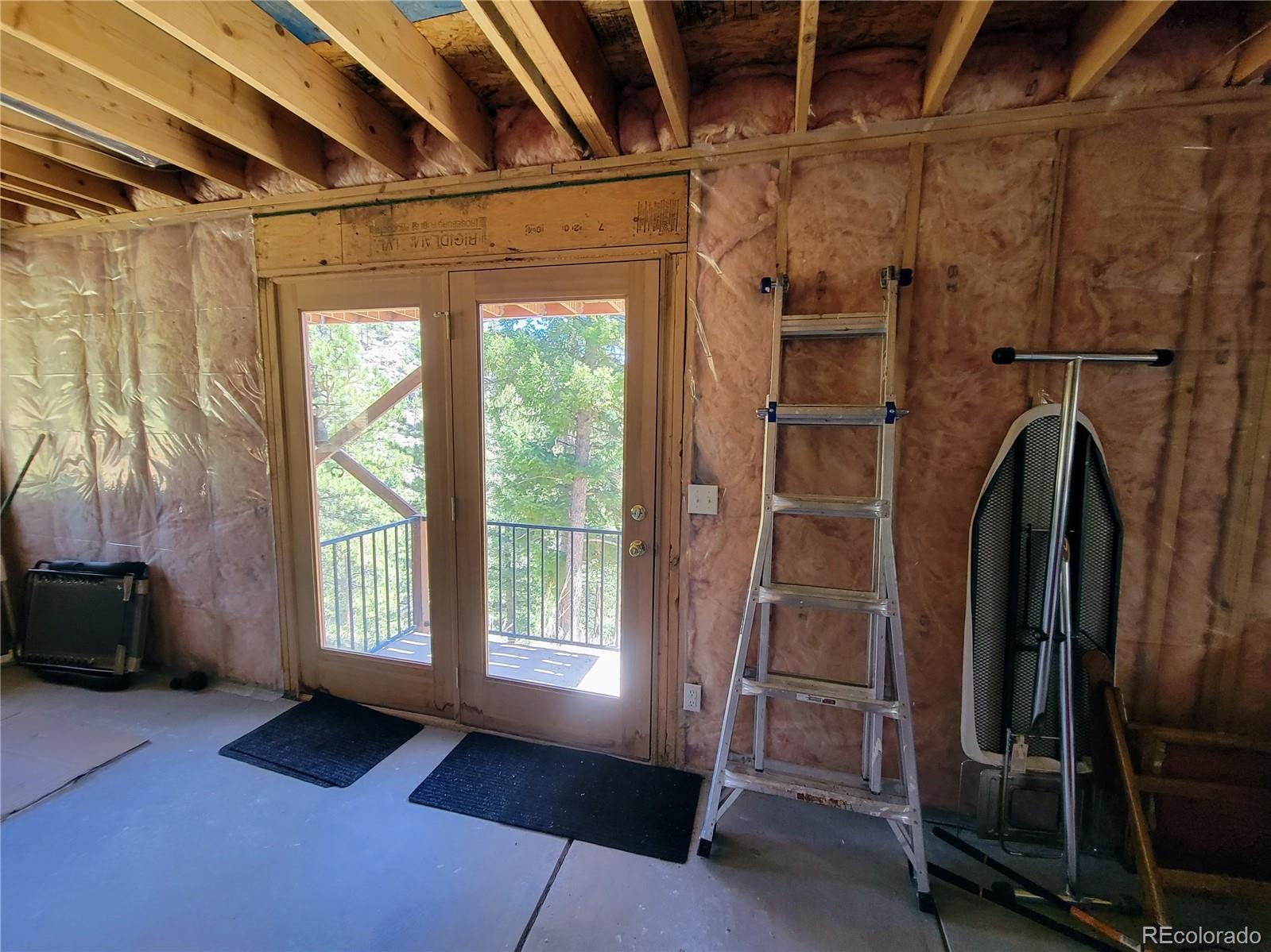 33348 Persistence Avenue Pine, CO 80470 - Photo 26 of 40 a view of walk in closet with clothes and shoes