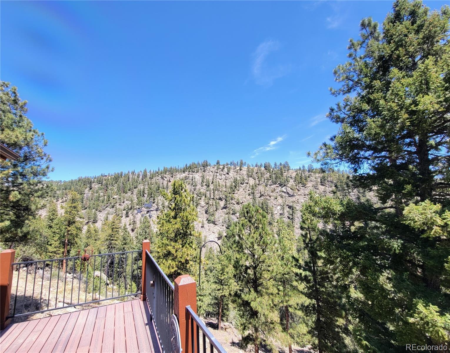 33348 Persistence Avenue Pine, CO 80470 - Photo 37 of 40 a view of a balcony with an outdoor space