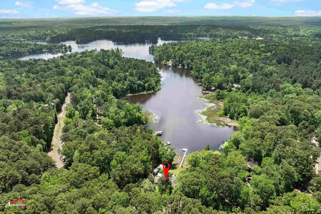 a view of a lake with a yard