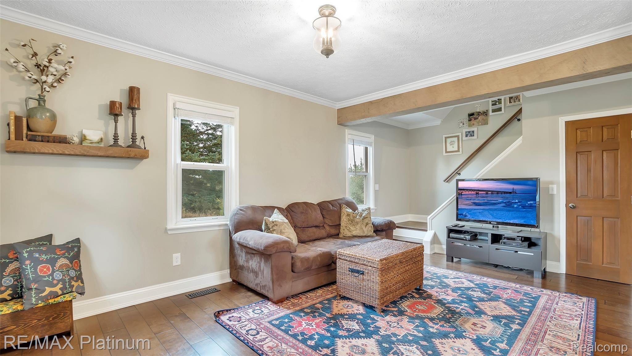 5240 Bentley Lake Road Howell, MI 48843 - Photo 7 of 30 Living Room With Beautiful Wood Floors