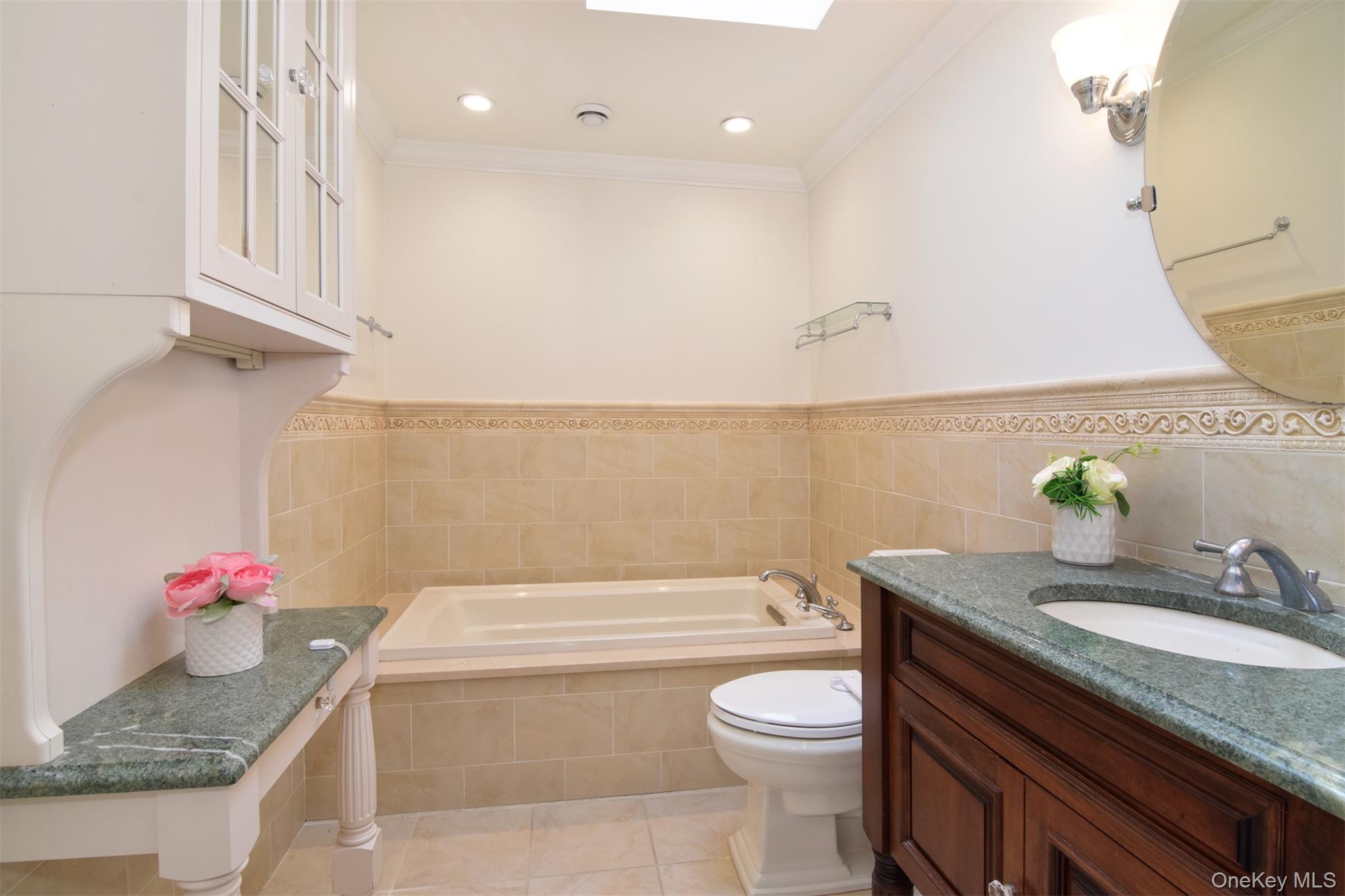 110 Valleyview Road Irvington, NY 10533 - Photo 15 of 36 Primary ensuite bathroom with walk in shower and soaking tub.