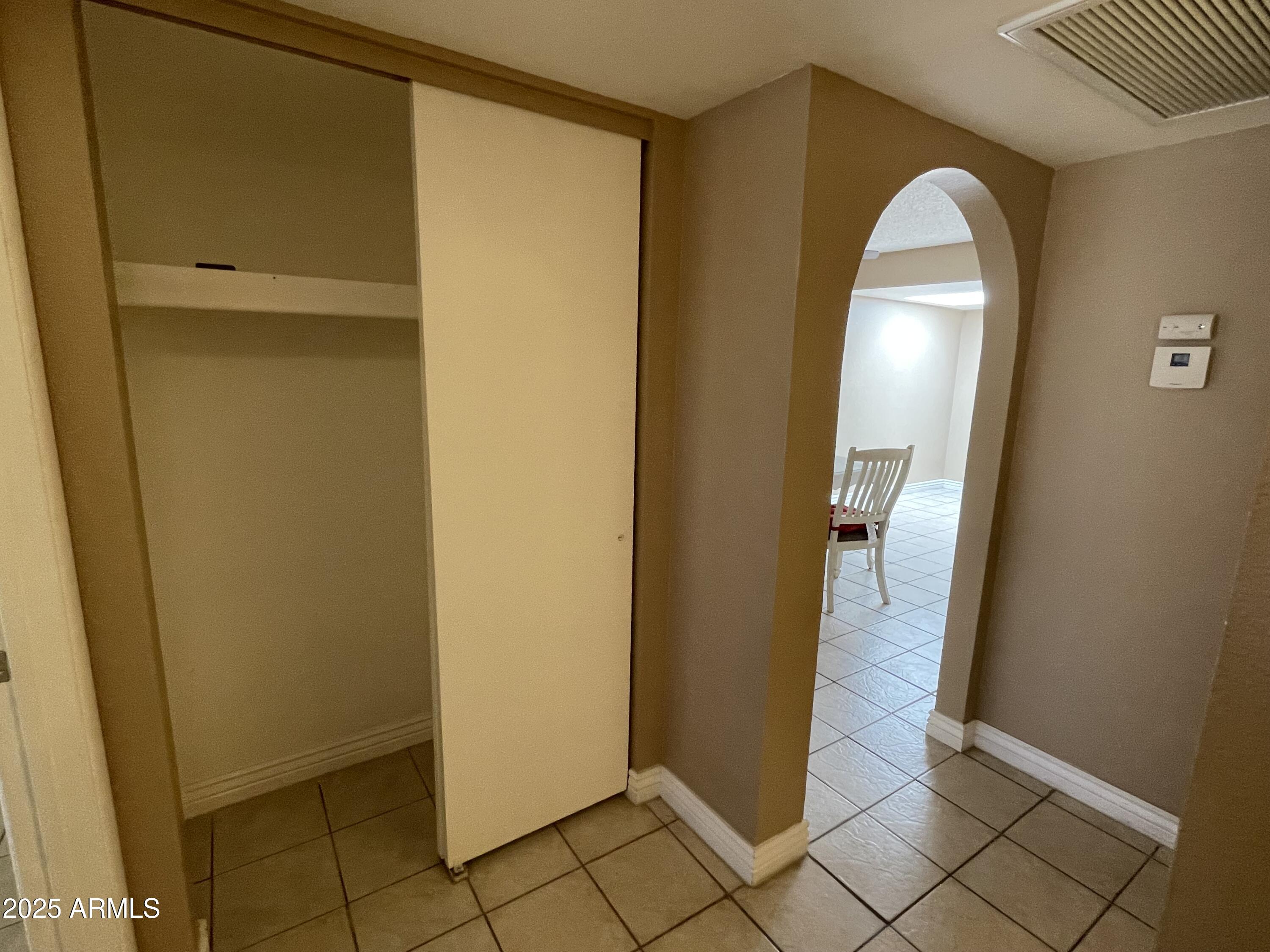 732 West Rice Drive Tempe, AZ 85283 - Photo 12 of 18 a view of a bathroom from a hallway