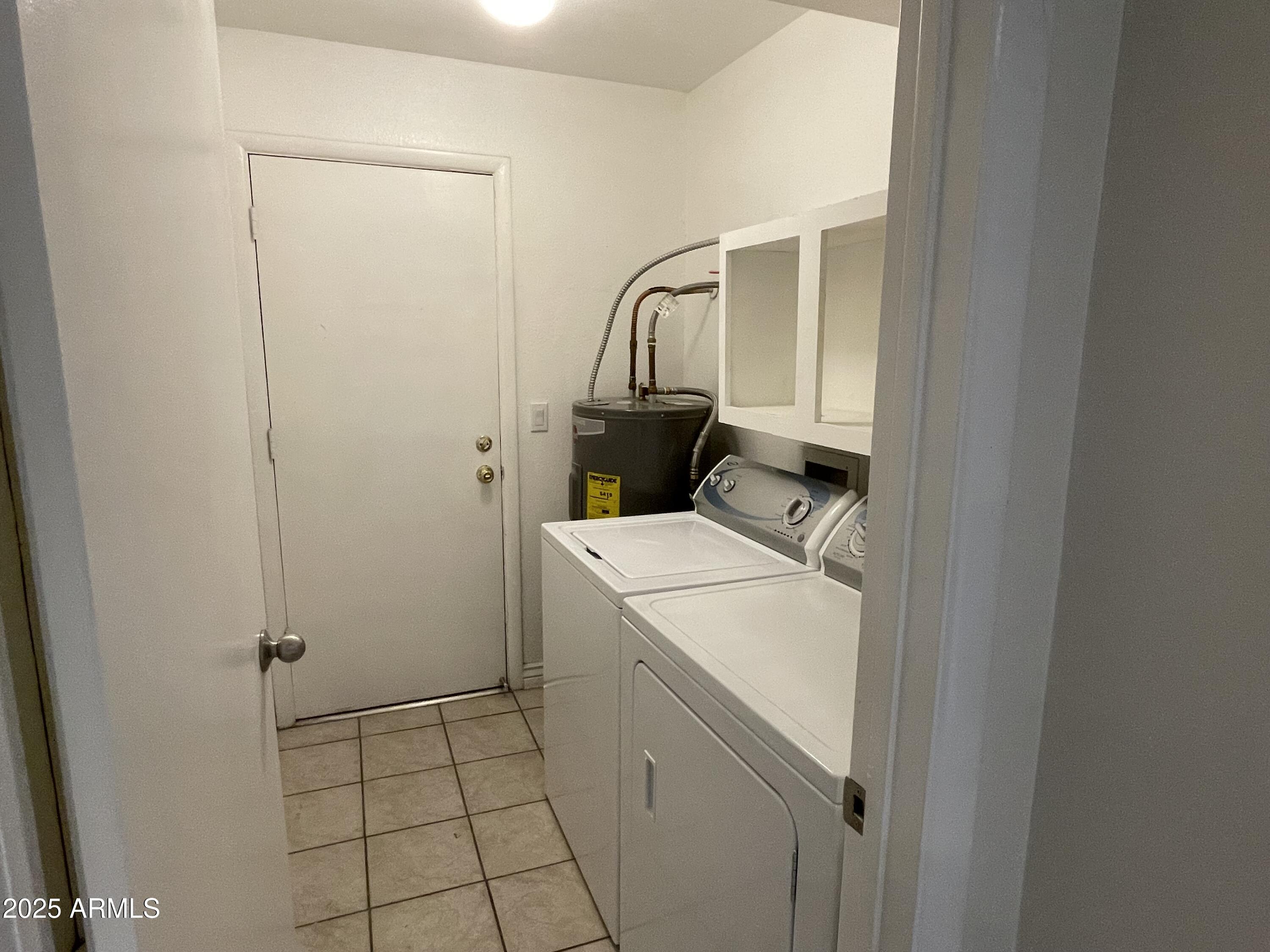 732 West Rice Drive Tempe, AZ 85283 - Photo 16 of 18 a utility room with dryer and washer