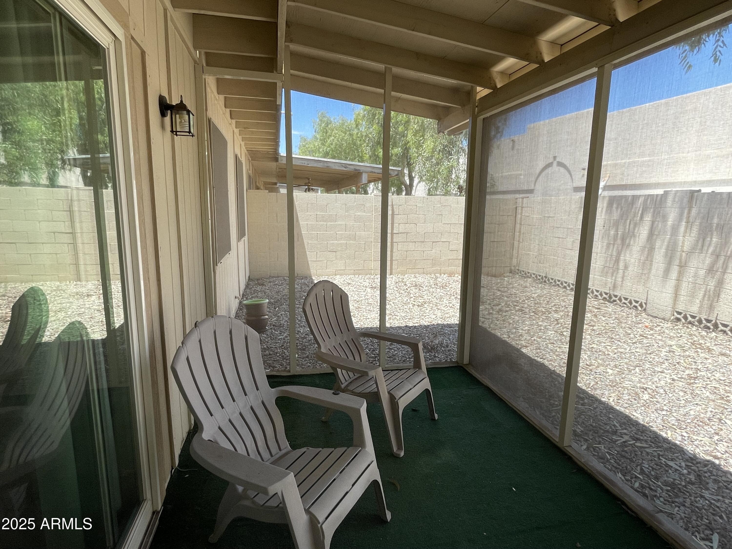 732 West Rice Drive Tempe, AZ 85283 - Photo 18 of 18 a view of a porch with furniture and a yard