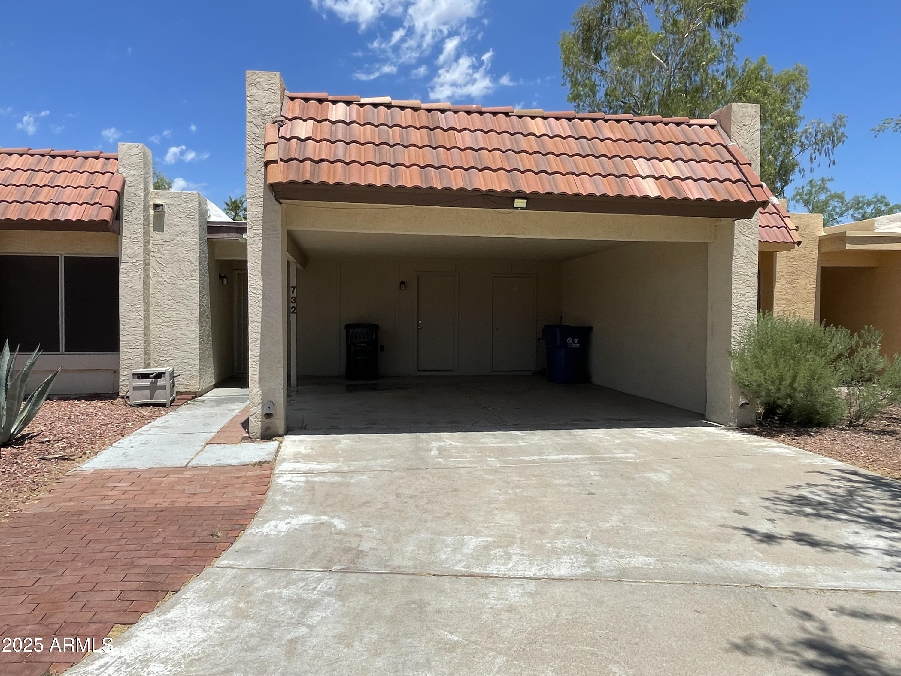 732 West Rice Drive Tempe, AZ 85283 - Photo 2 of 18 a view of a patio with a table and chairs