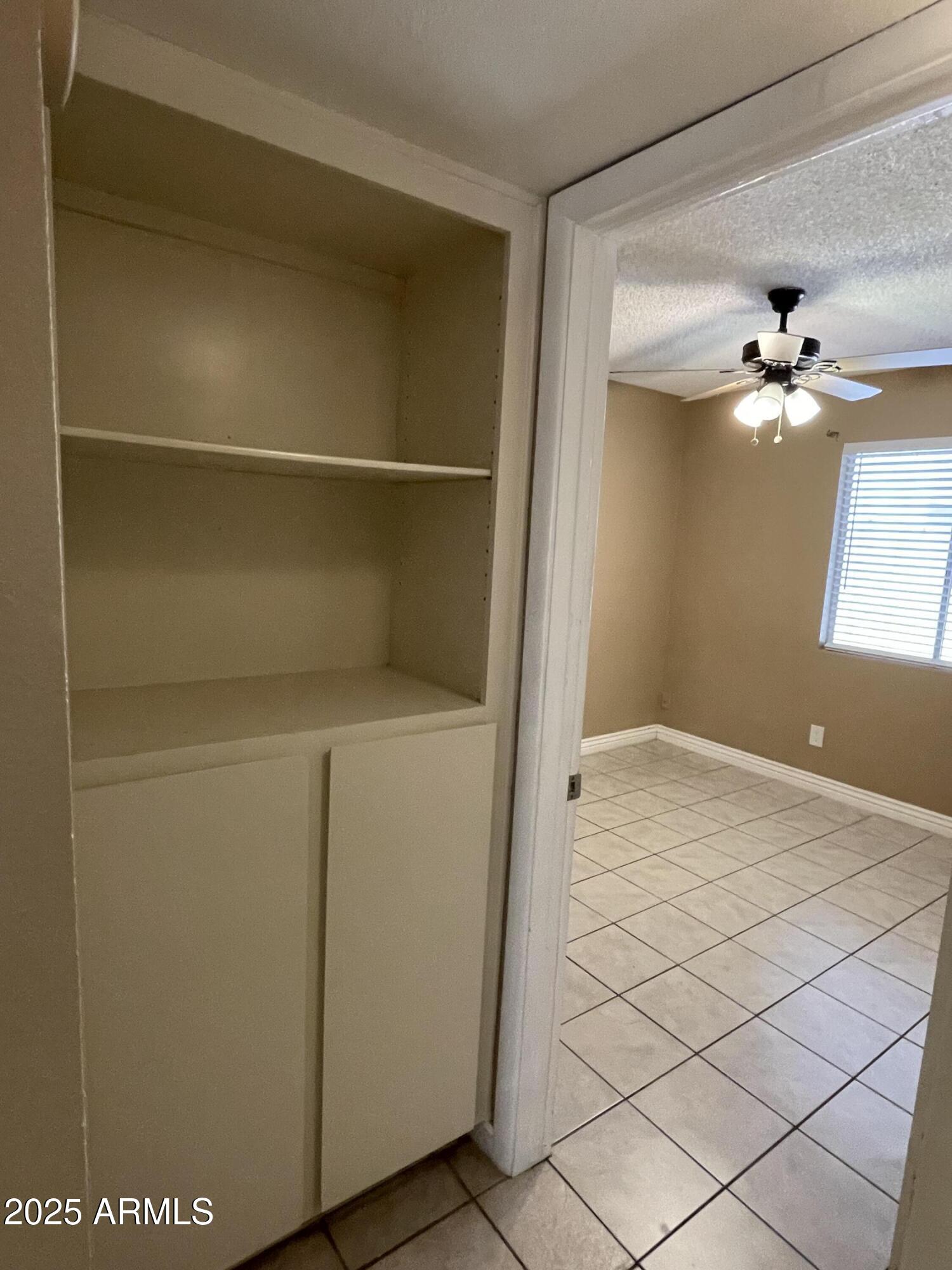 732 West Rice Drive Tempe, AZ 85283 - Photo 9 of 18 a view of a storage & utility room with a sink