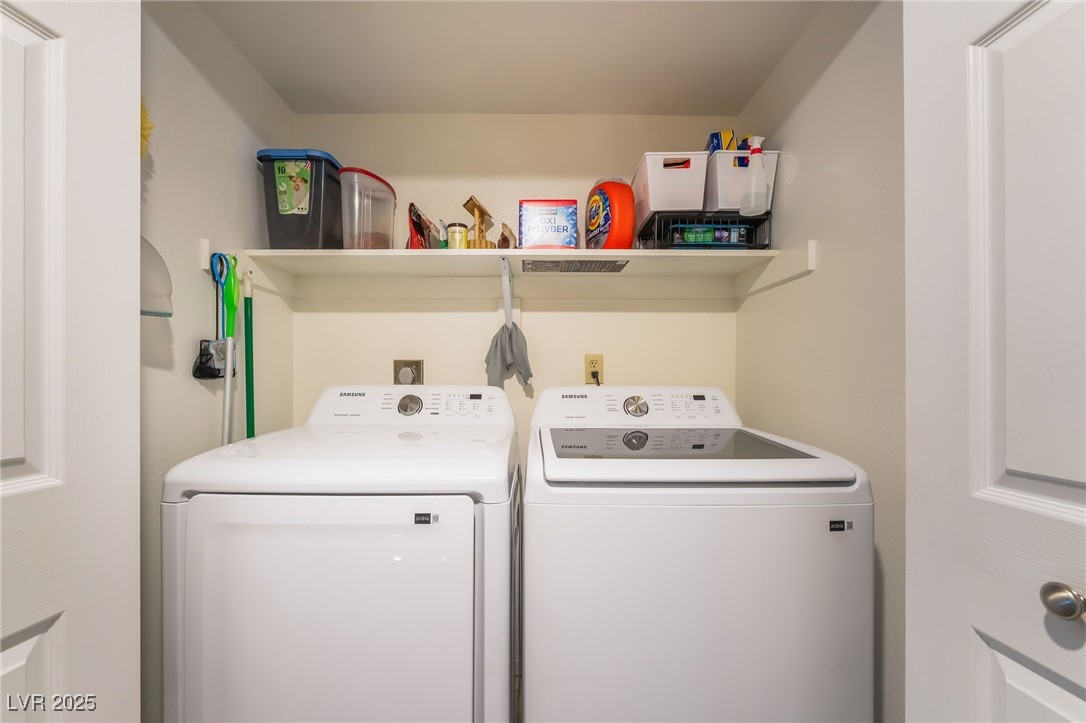 1575 West Warm Springs Road, Unit 2822 Henderson, NV 89014 - Photo 34 of 37 Laundry area featuring washer and clothes dryer