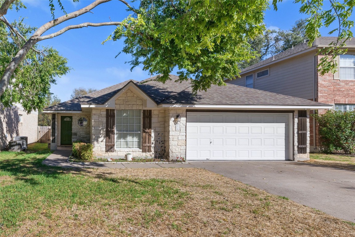 2319 Clover Ridge Drive Cedar Park, TX 78613 - Photo 1 of 1 a front view of a house with yard