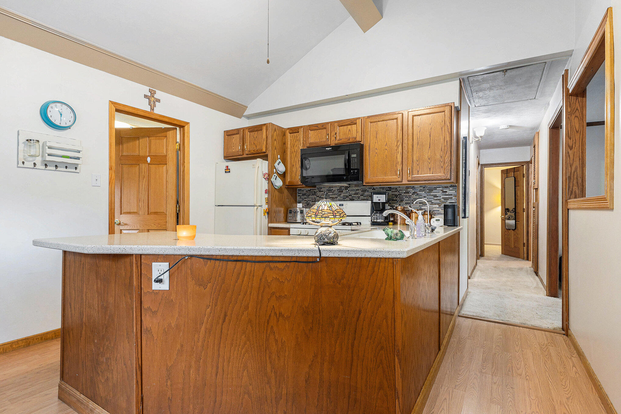 520 Johnson Road Michigan City, IN 46360 - Photo 4 of 11 a kitchen with stainless steel appliances granite countertop a sink and cabinets