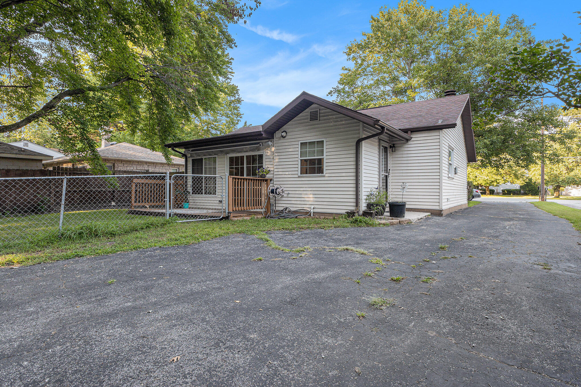 520 Johnson Road Michigan City, IN 46360 - Photo 9 of 11 a view of a house with yard and a garden