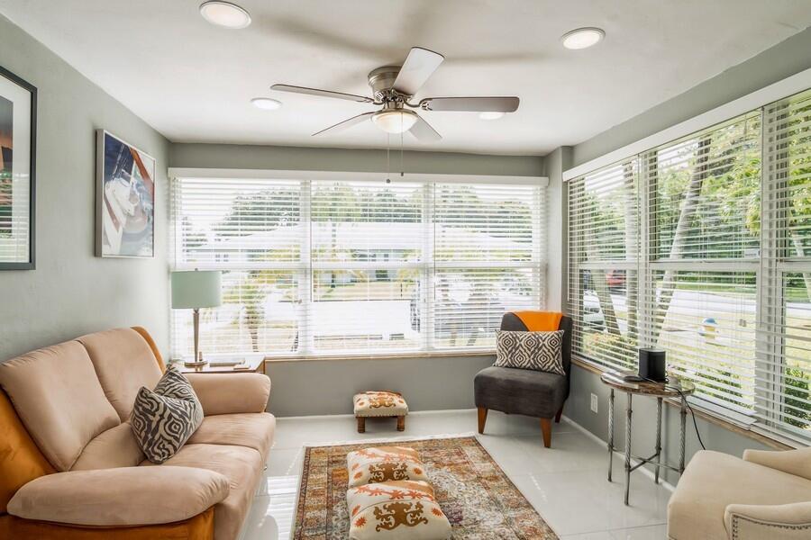 1230 South Drive Way, Unit A Delray Beach, FL 33445 - Photo 13 of 26 a living room with furniture and a large window