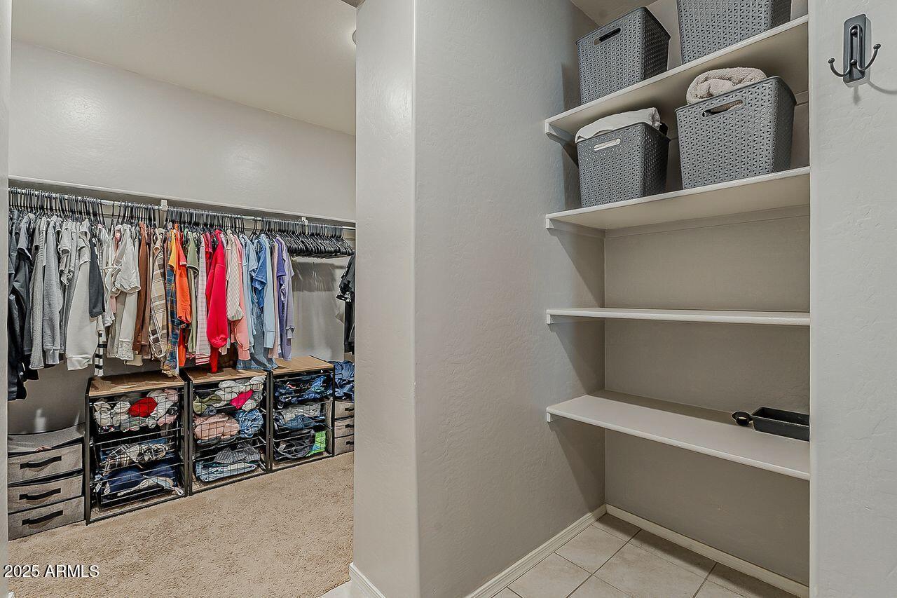 8721 South 253rd Drive Buckeye, AZ 85326 - Photo 19 of 44 a view of storage and utility room