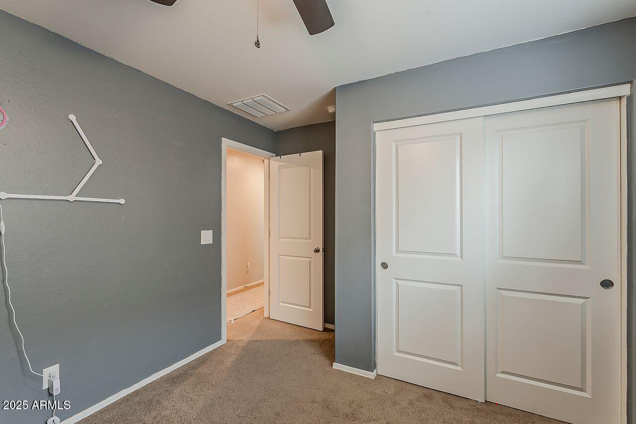8721 South 253rd Drive Buckeye, AZ 85326 - Photo 25 of 44 a view of an empty room