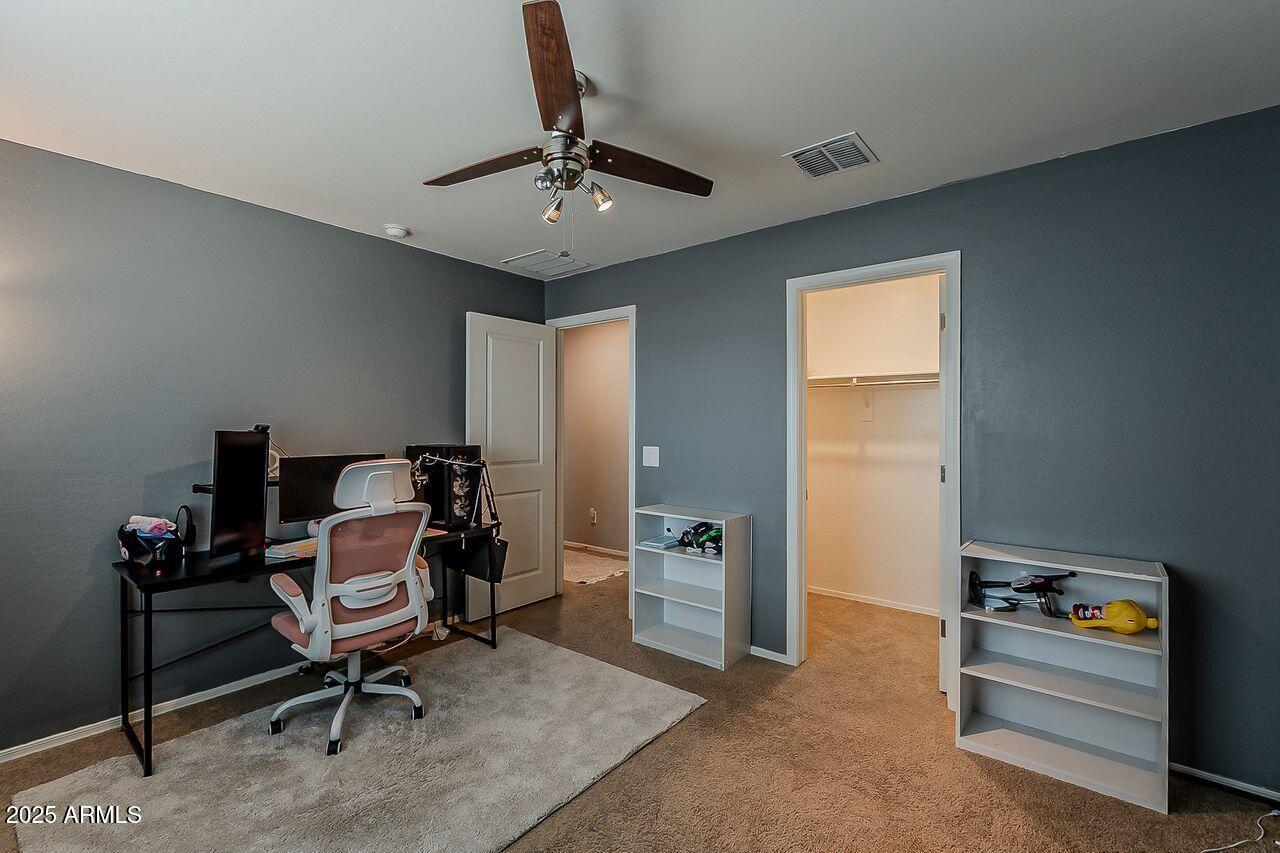 8721 South 253rd Drive Buckeye, AZ 85326 - Photo 27 of 44 a view of a workspace with furniture
