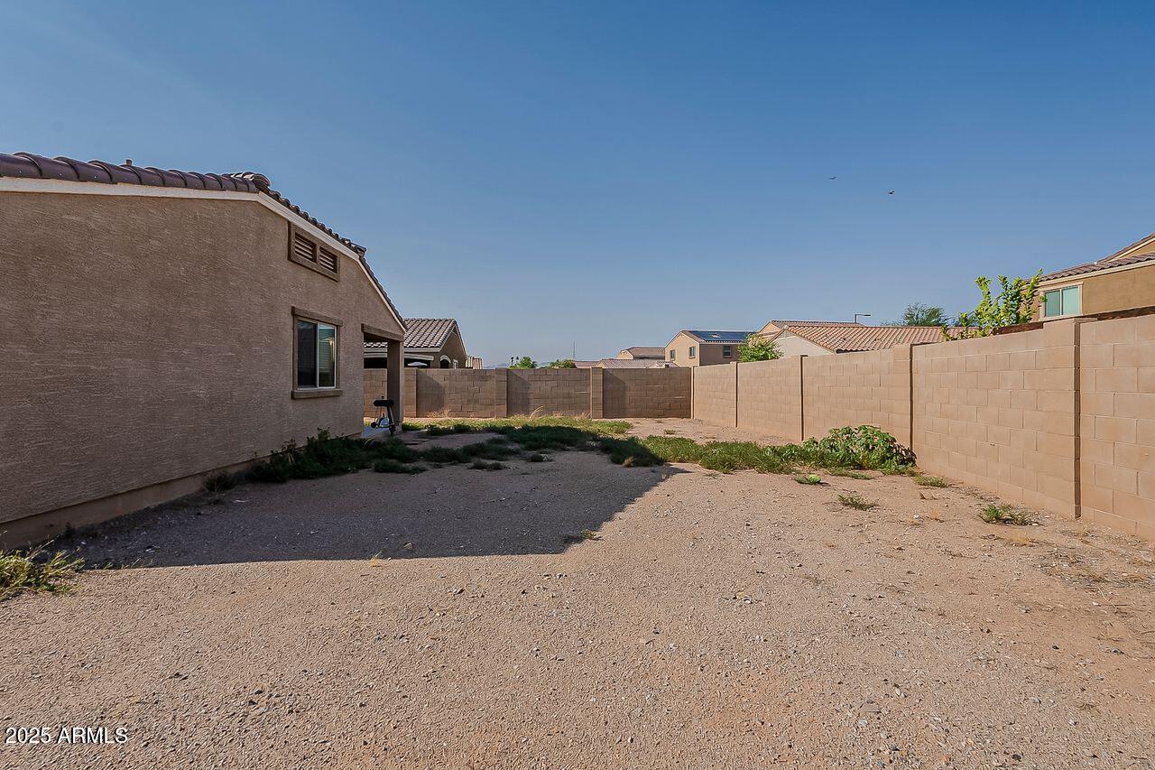 8721 South 253rd Drive Buckeye, AZ 85326 - Photo 35 of 44 a street view with a road