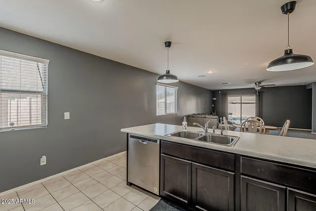a bathroom with a sink a vanity and a mirror