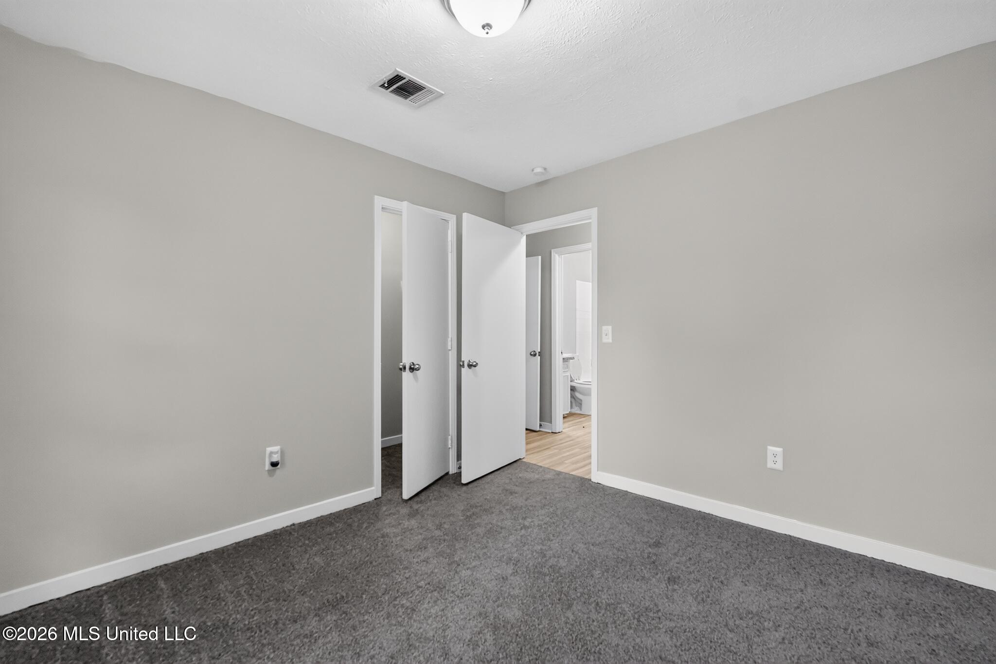 334 East Timber Ridge Court Ridgeland, MS 39157 - Photo 18 of 22 20_334_E_Timber_Ridge_Ct-Bedroom-9910