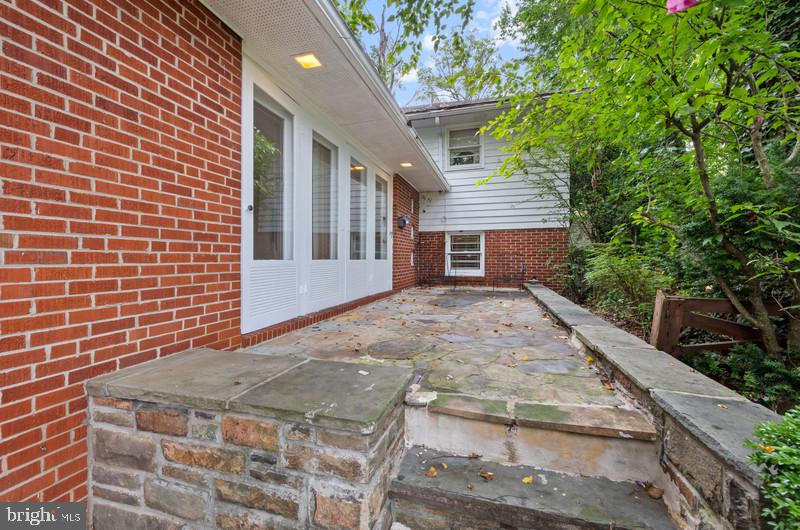 4109 Westview Road Baltimore, MD 21218 - Photo 2 of 35 a view of a house with a yard and potted plants