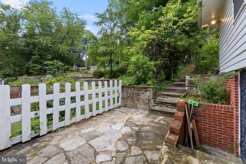4109 Westview Road Baltimore, MD 21218 - Photo 4 of 35 a view of street with wooden fence
