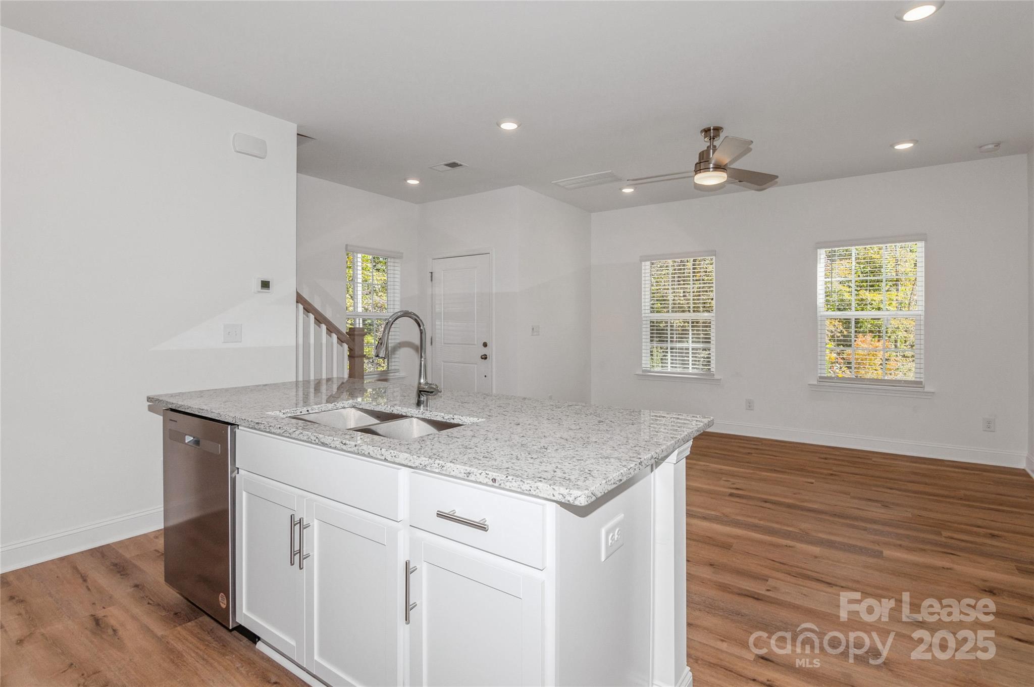 6006 Cedar Chip Way Matthews, NC 28105 - Photo 14 of 35 a bathroom with a granite countertop sink and a mirror