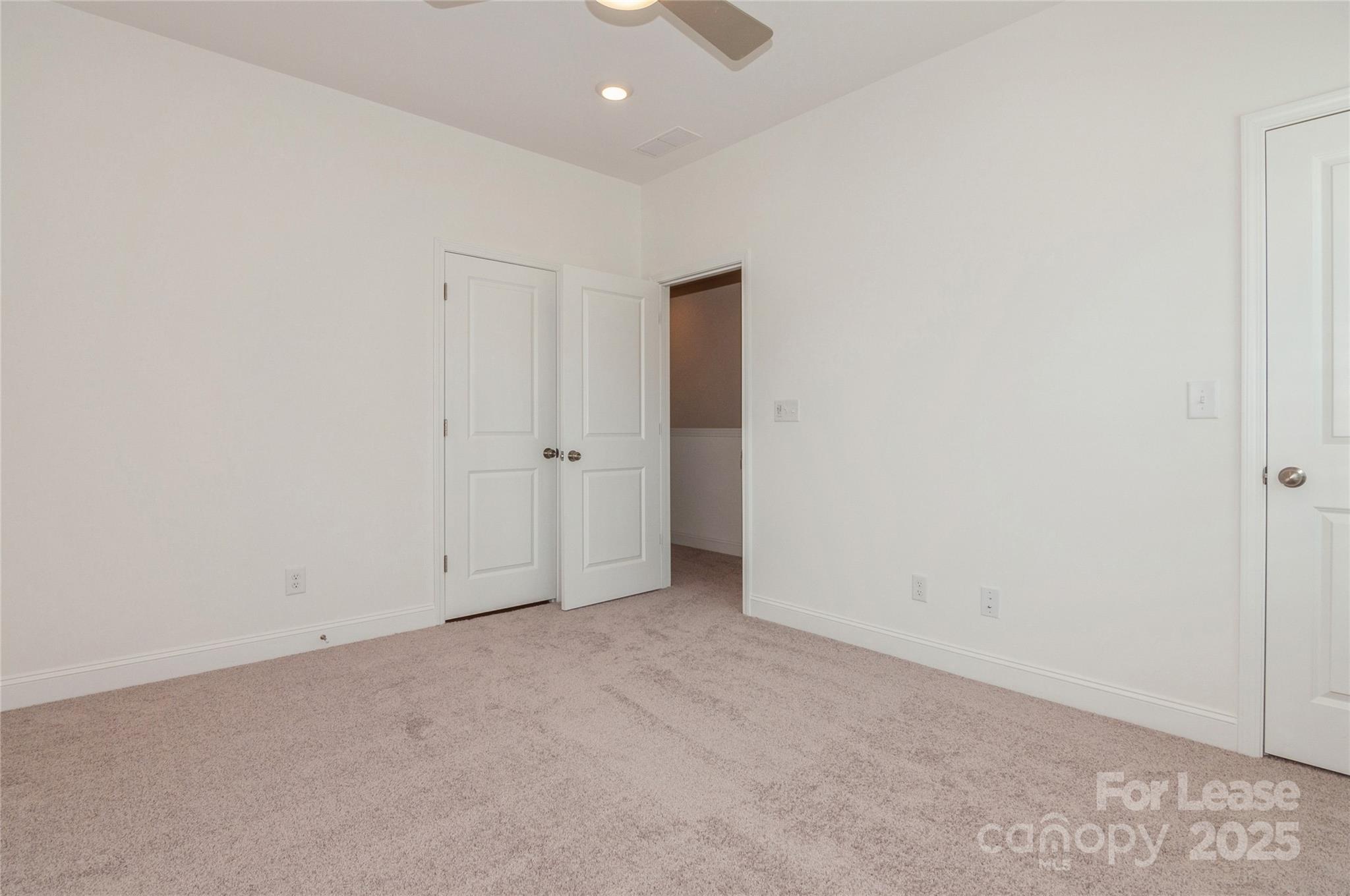 6006 Cedar Chip Way Matthews, NC 28105 - Photo 19 of 35 an empty room with an entryway