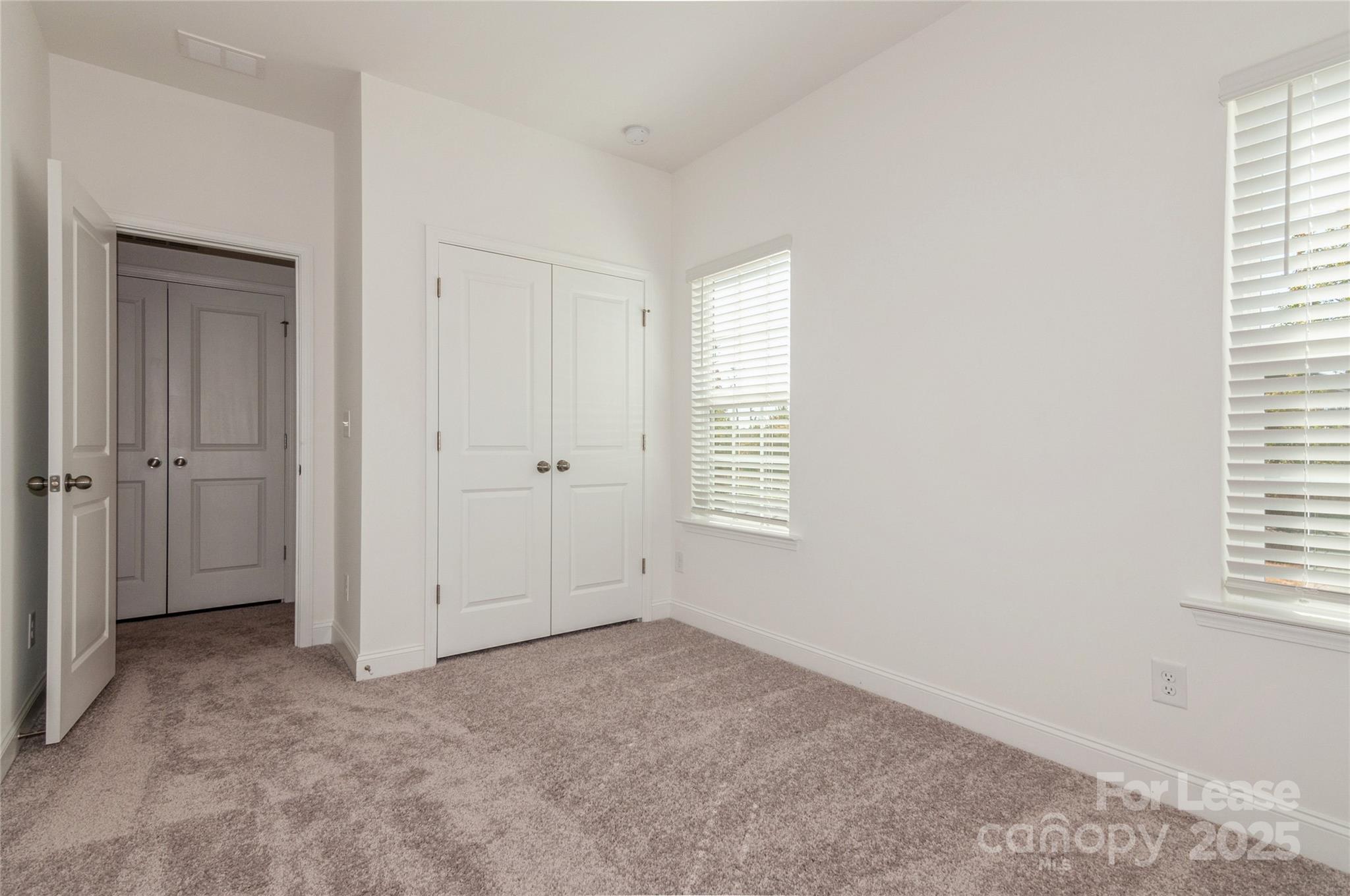 6006 Cedar Chip Way Matthews, NC 28105 - Photo 28 of 35 an empty room with windows