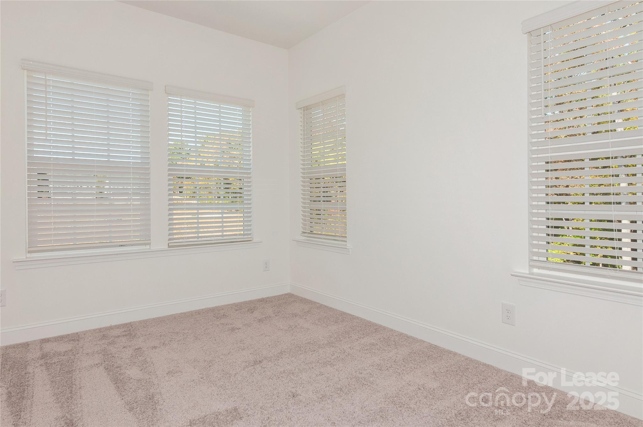6006 Cedar Chip Way Matthews, NC 28105 - Photo 30 of 35 a view of an empty room with a window