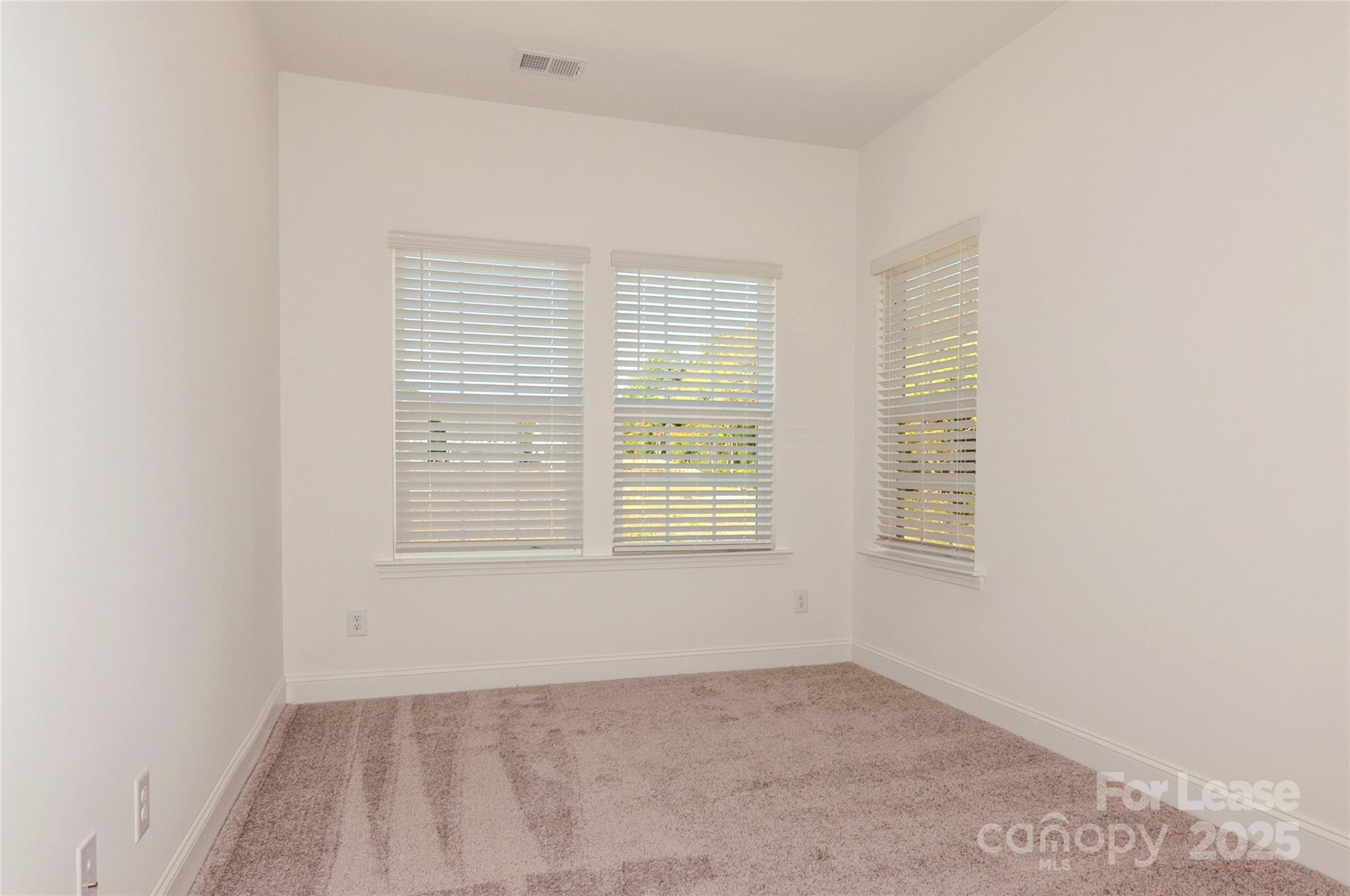 6006 Cedar Chip Way Matthews, NC 28105 - Photo 33 of 35 a view of an empty room with a window