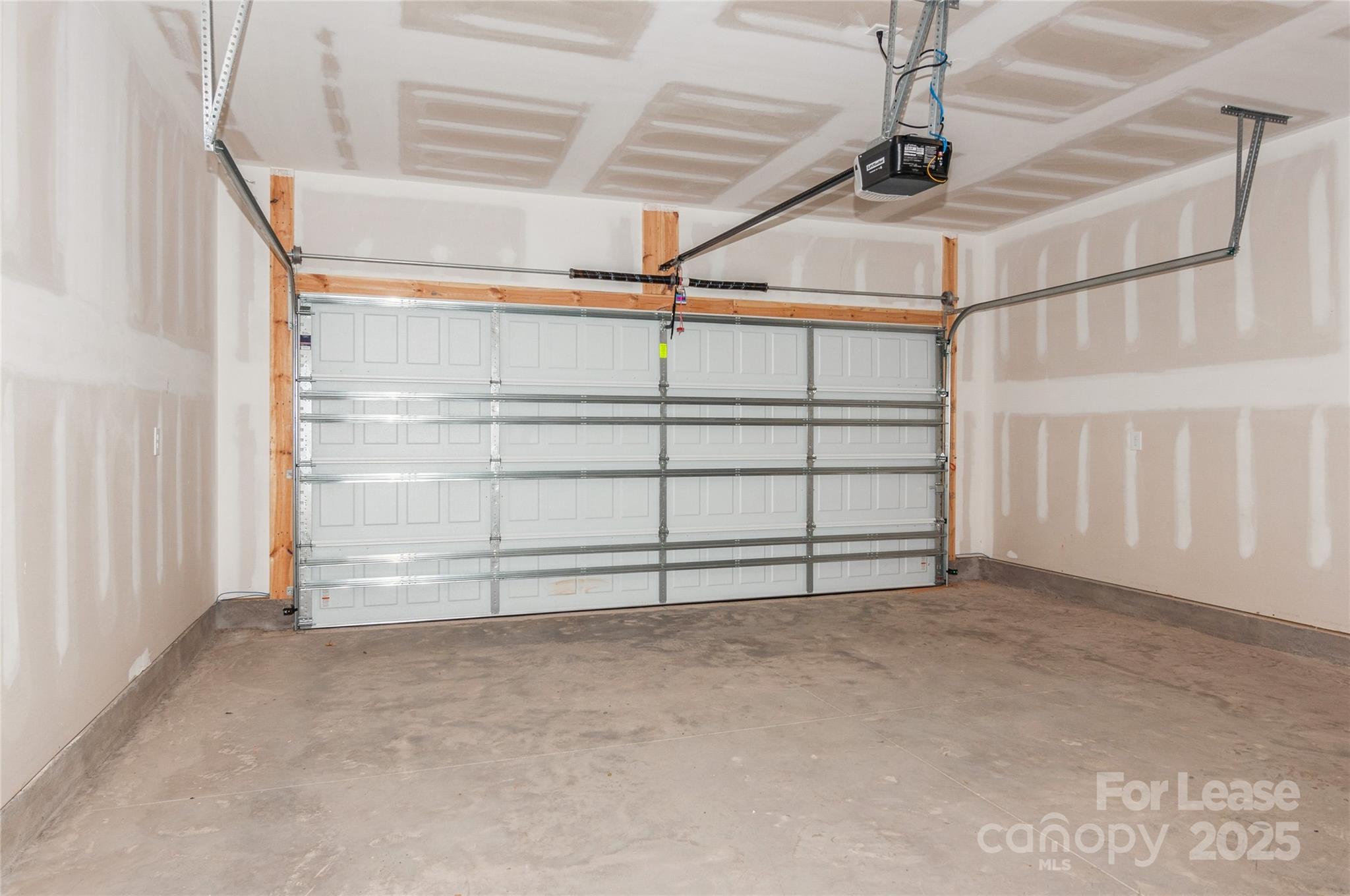 6006 Cedar Chip Way Matthews, NC 28105 - Photo 9 of 35 a view of an empty garage