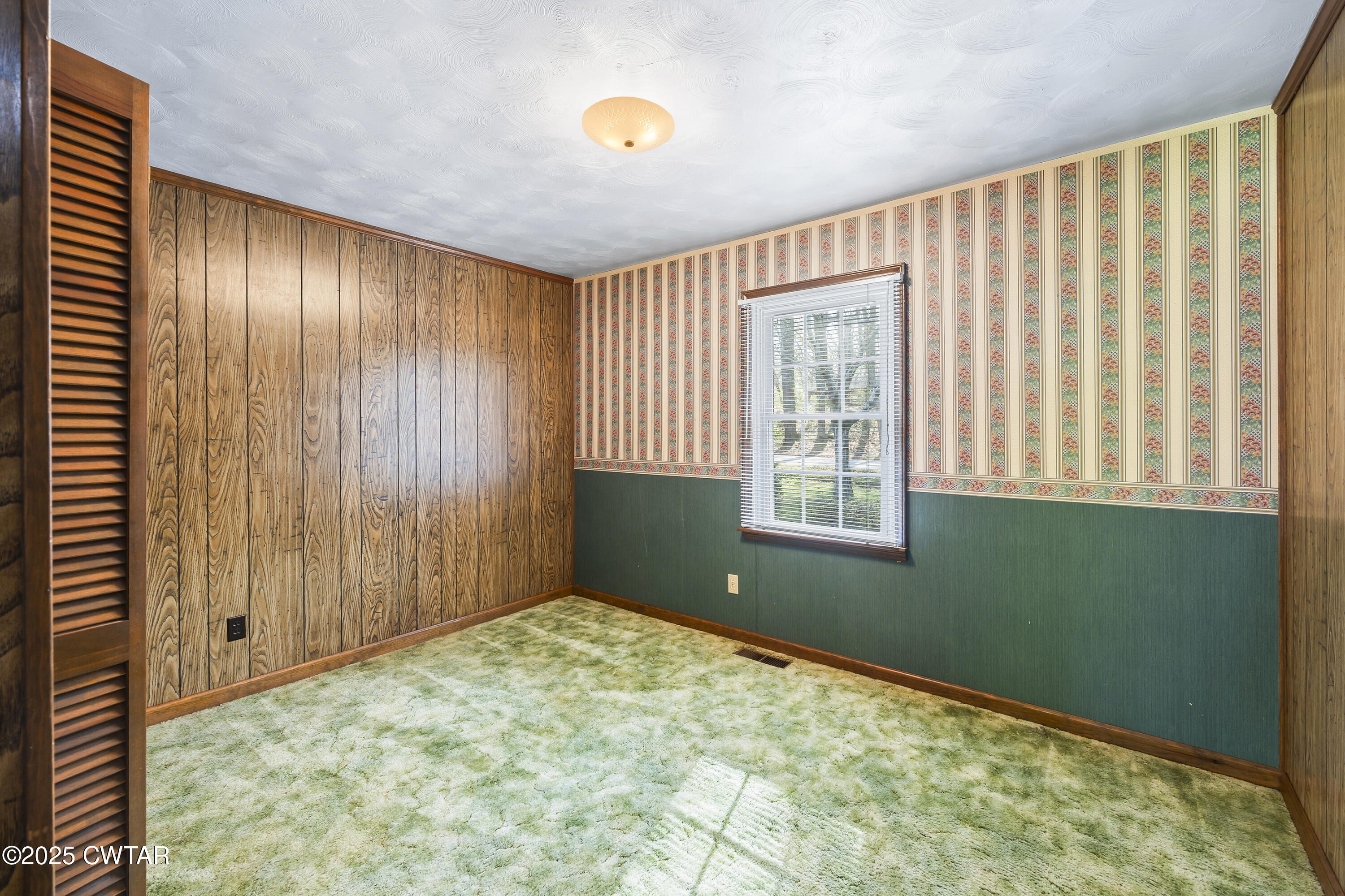325 Deep Gap Road Jackson, TN 38301 - Photo 12 of 19 a view of an empty room with a window
