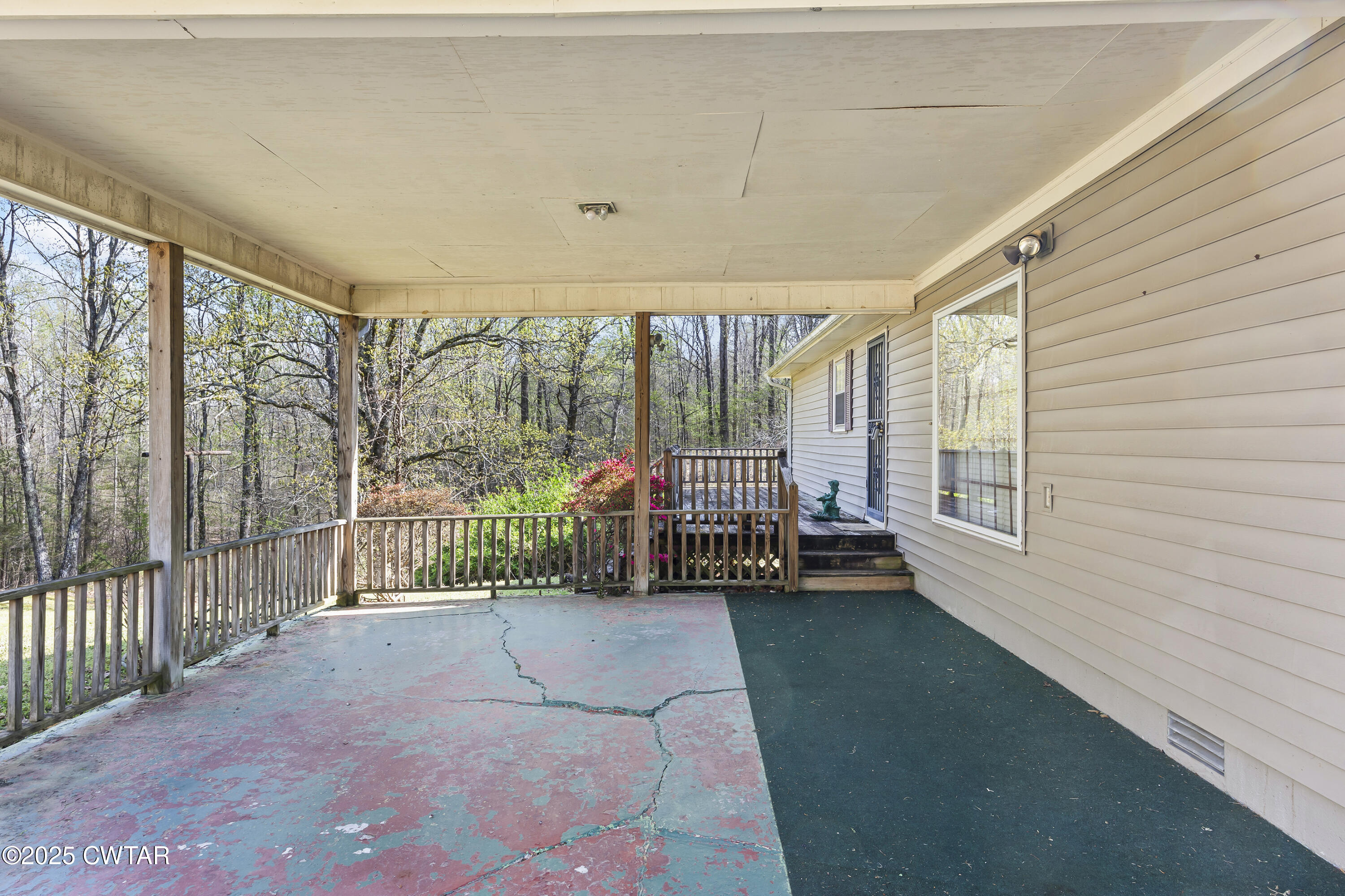 325 Deep Gap Road Jackson, TN 38301 - Photo 17 of 19 a bedroom with a bed and a large window