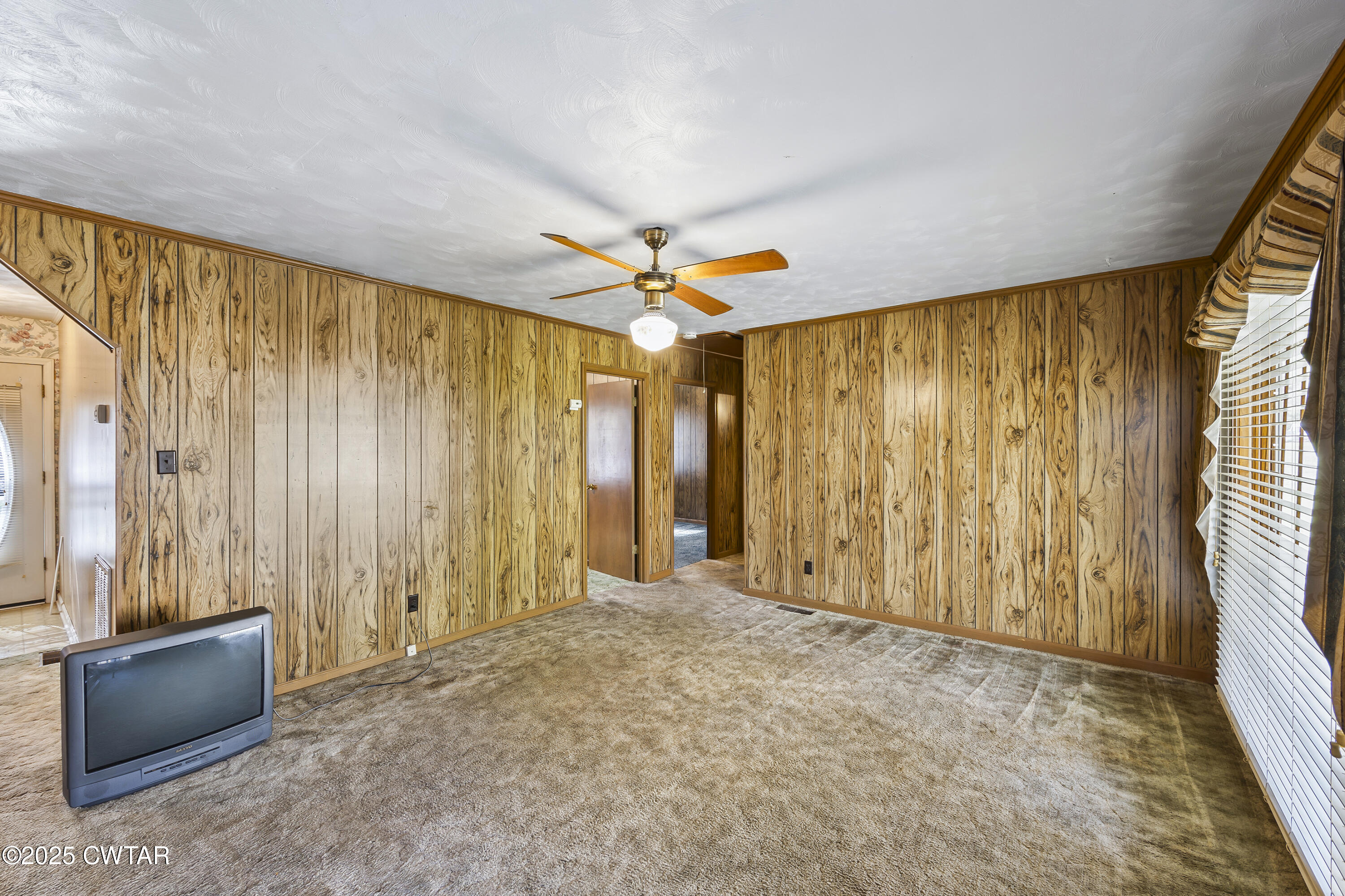 325 Deep Gap Road Jackson, TN 38301 - Photo 8 of 19 a view of an empty room with a window
