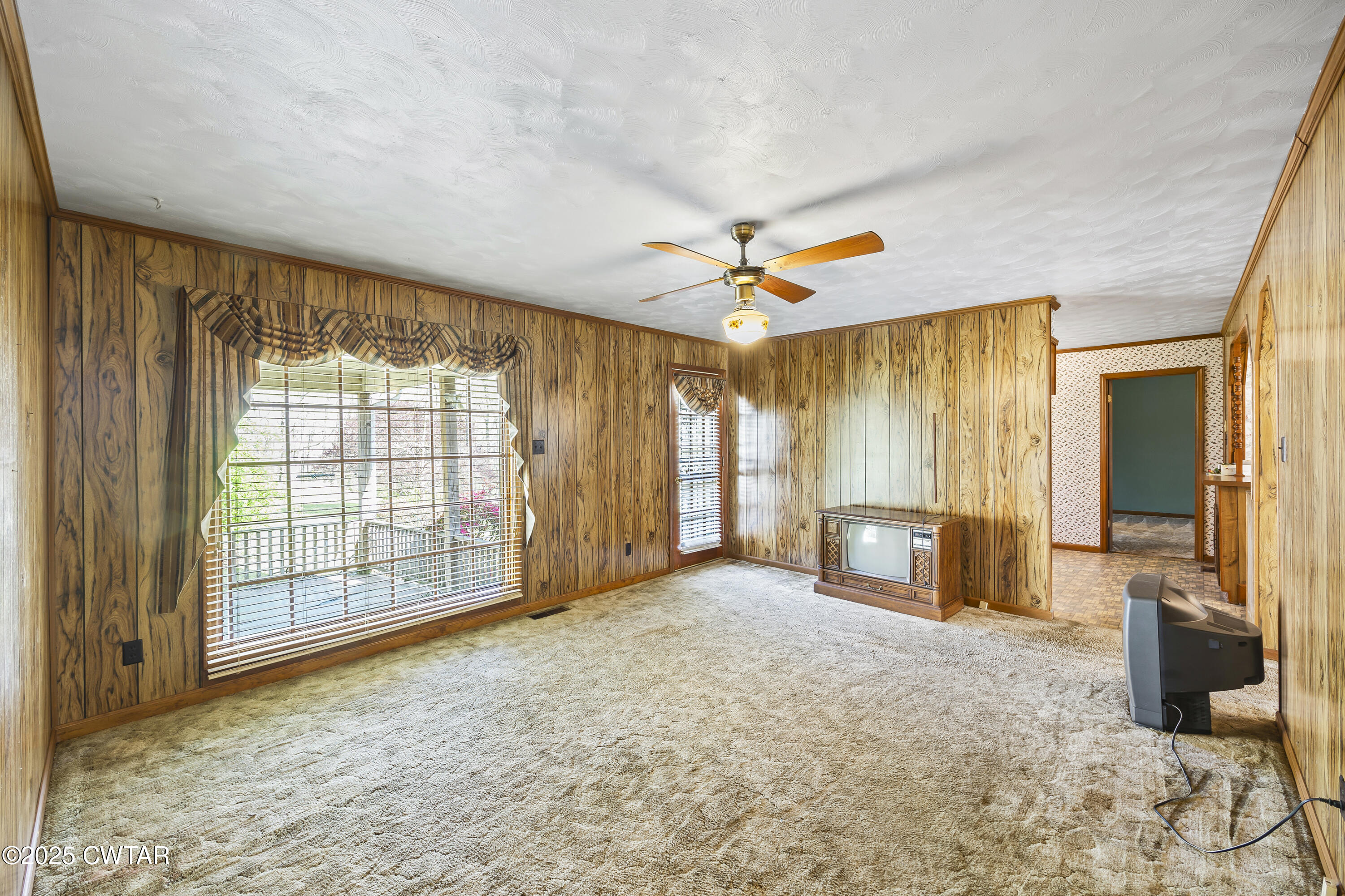 325 Deep Gap Road Jackson, TN 38301 - Photo 10 of 19 a view of an empty room with a window