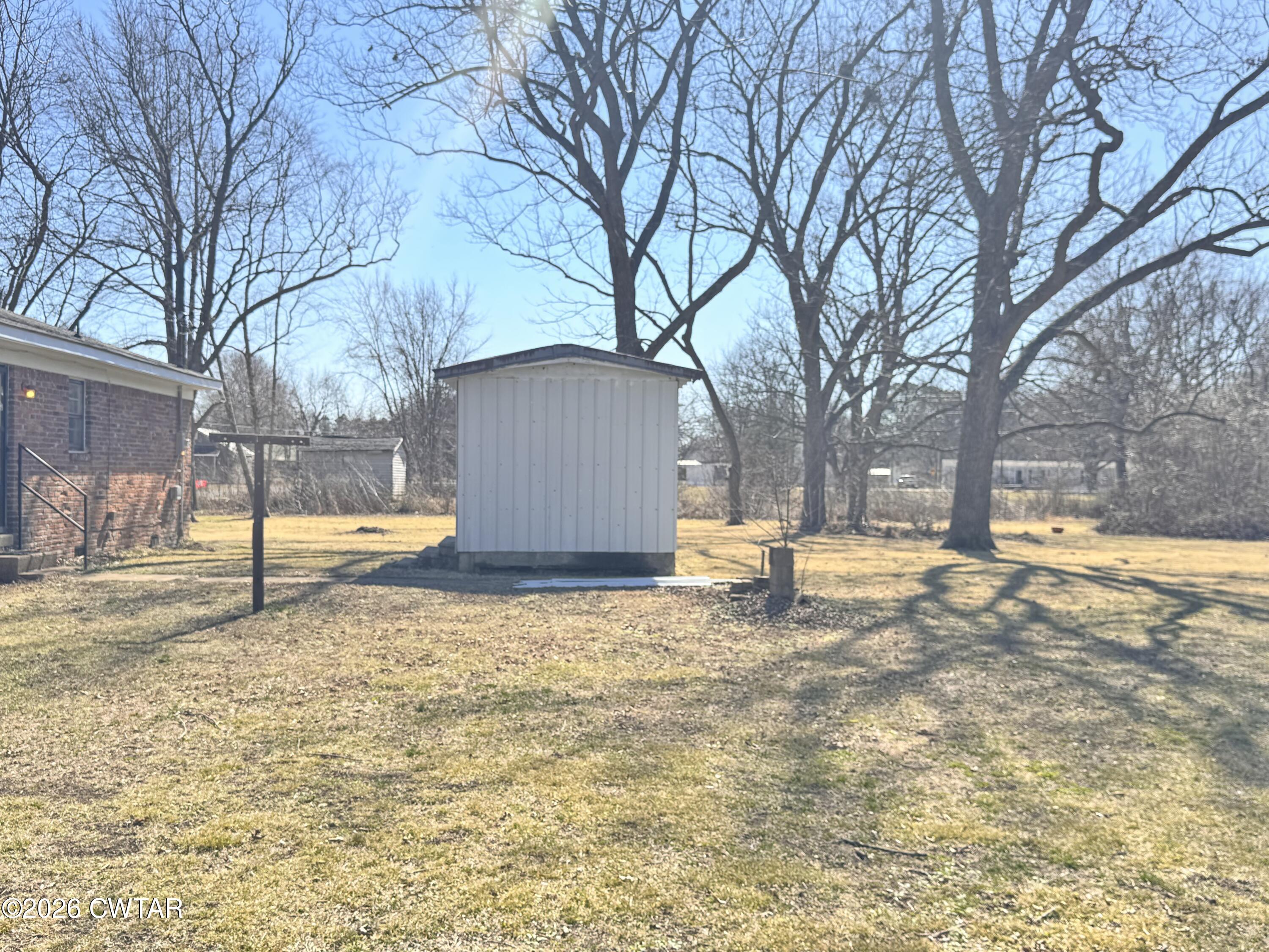 567 North Church Street Rives, TN 38253 - Photo 15 of 17 a view of a yard with a large tree