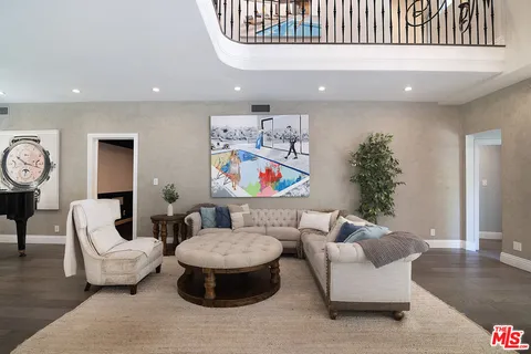 a view of hallway with a large mirror