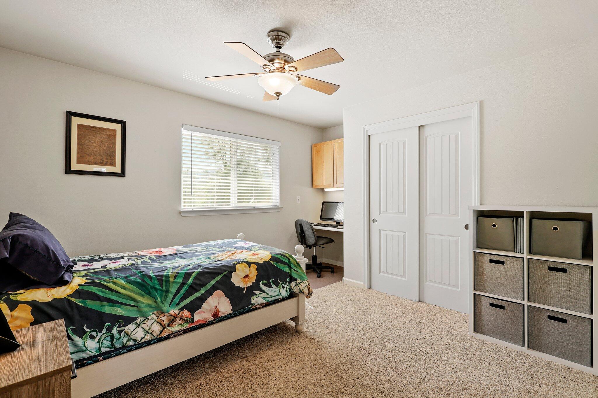 6949 Rector Creek Road Igo, CA 96047 - Photo 22 of 110 a bedroom with a bed and a chandelier