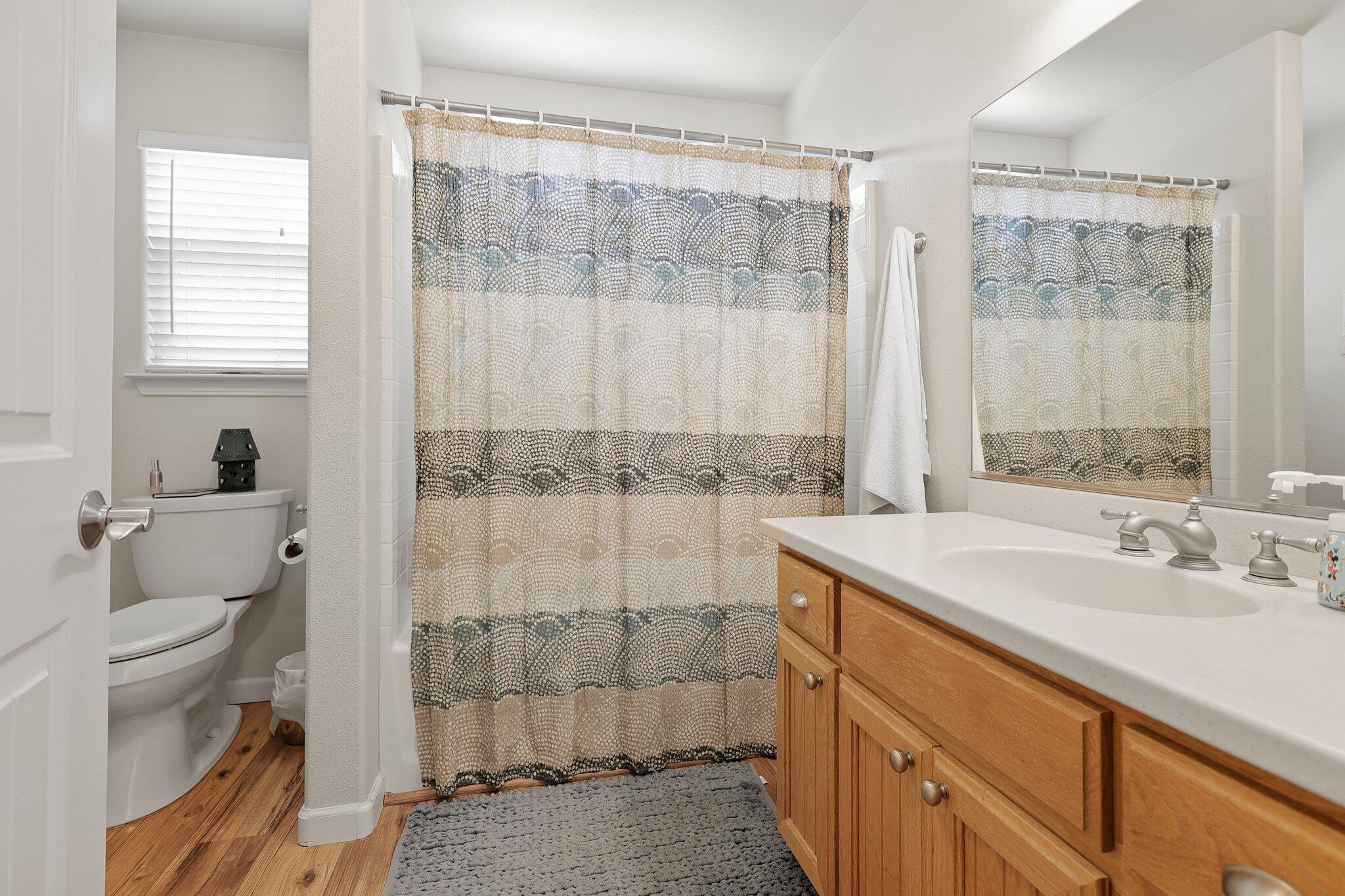 6949 Rector Creek Road Igo, CA 96047 - Photo 26 of 110 a bathroom with a sink a toilet and shower