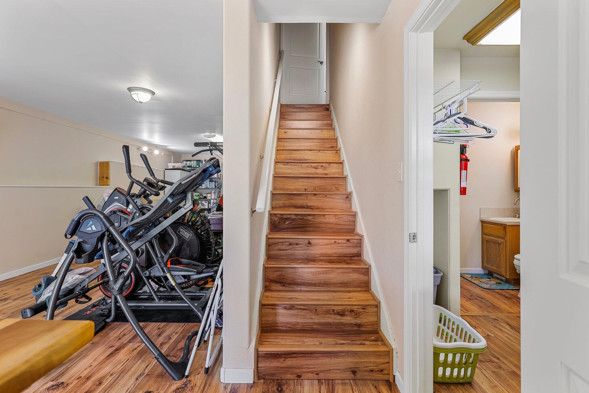 6949 Rector Creek Road Igo, CA 96047 - Photo 40 of 110 a view of a livingroom with wooden floor and stairs
