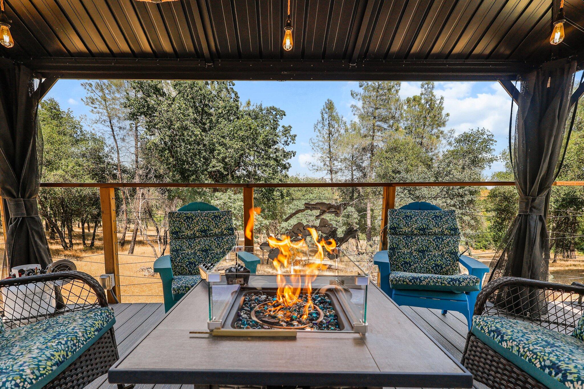 6949 Rector Creek Road Igo, CA 96047 - Photo 52 of 110 a living room filled with furniture and a large window