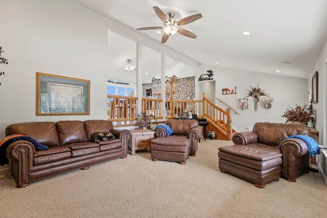 a living room with a couch and a fireplace