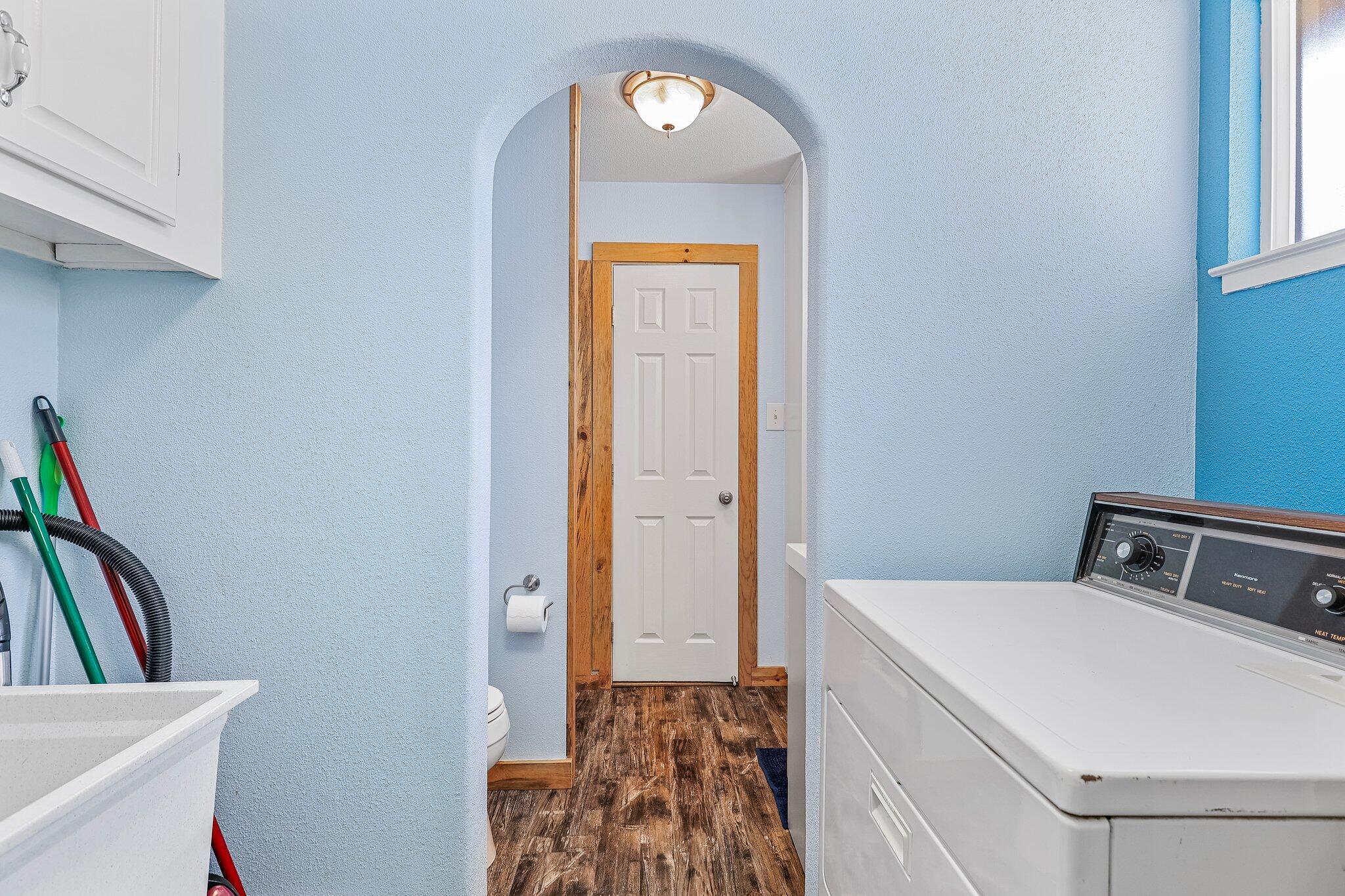 6949 Rector Creek Road Igo, CA 96047 - Photo 73 of 110 a bathroom with a toilet sink and a window