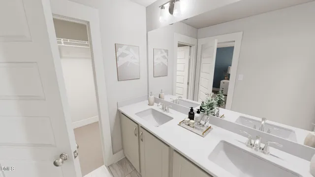 a bathroom with a double vanity sink mirror and double