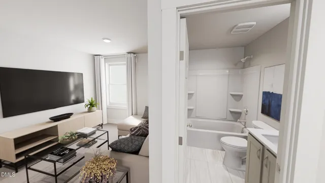 a living room with furniture and a flat screen tv