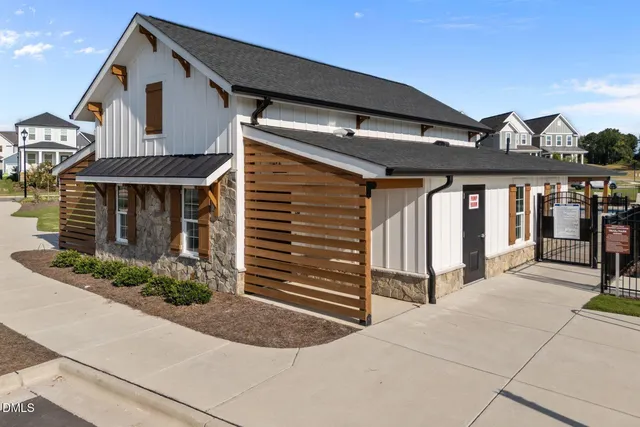 a front view of a house with garage