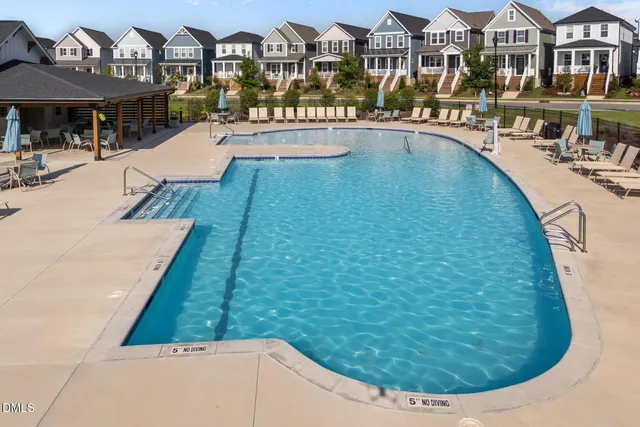 a view of swimming pool from a balcony