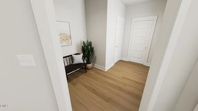 a room with a bed and a mirror