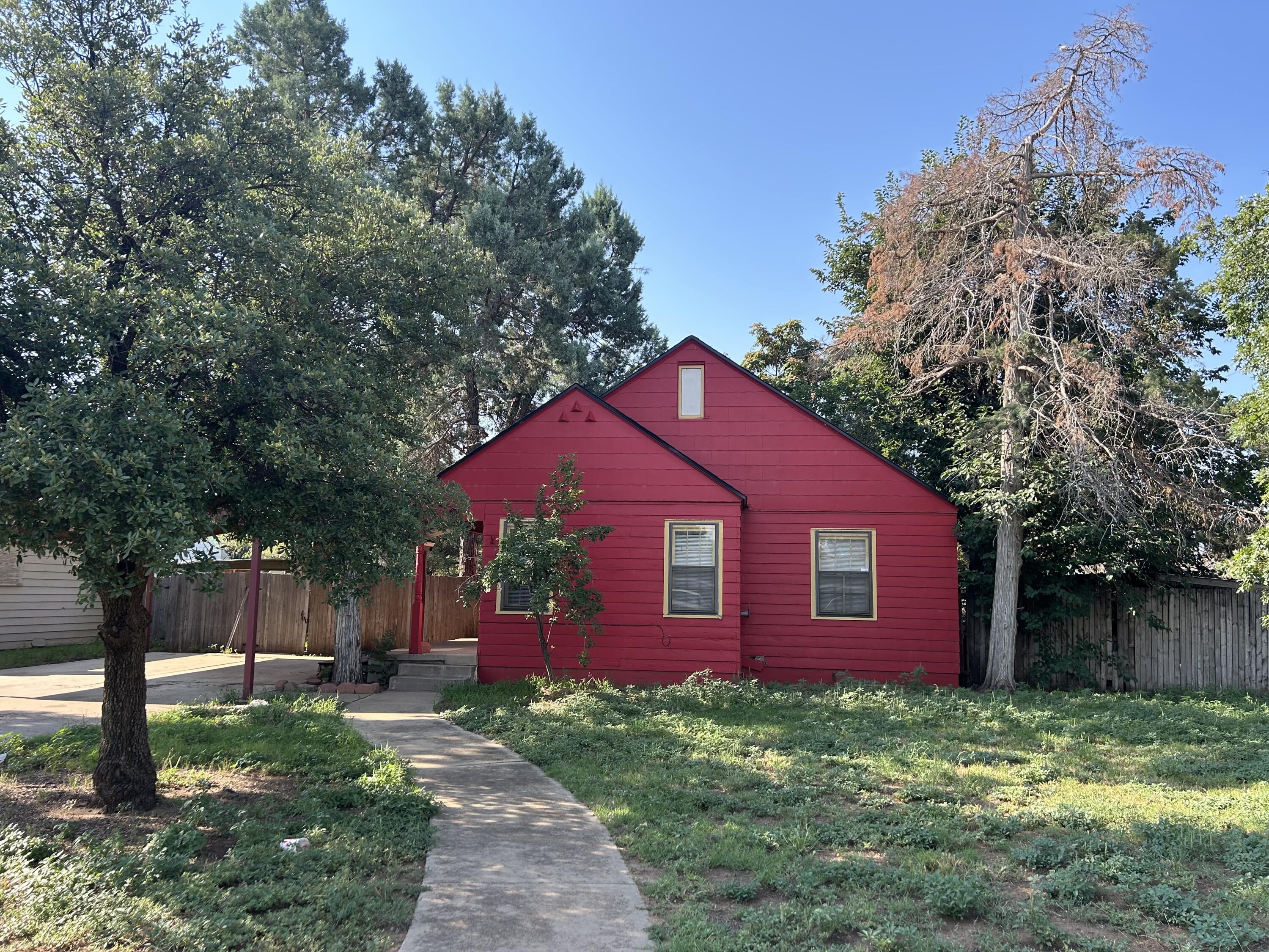 2011 31st Street Lubbock, TX 79411 - Photo 2 of 10 a view of a yard in front of a house