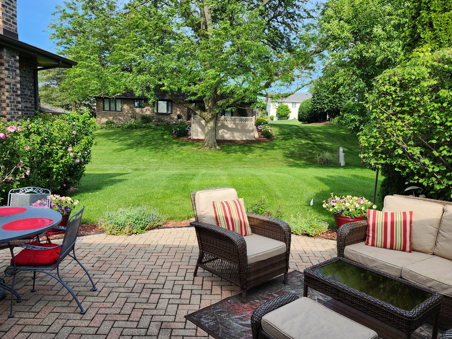 13031 Winnebago Road Palos Heights, IL 60463 - Photo 29 of 31 a view of a patio with couches chairs and a yard