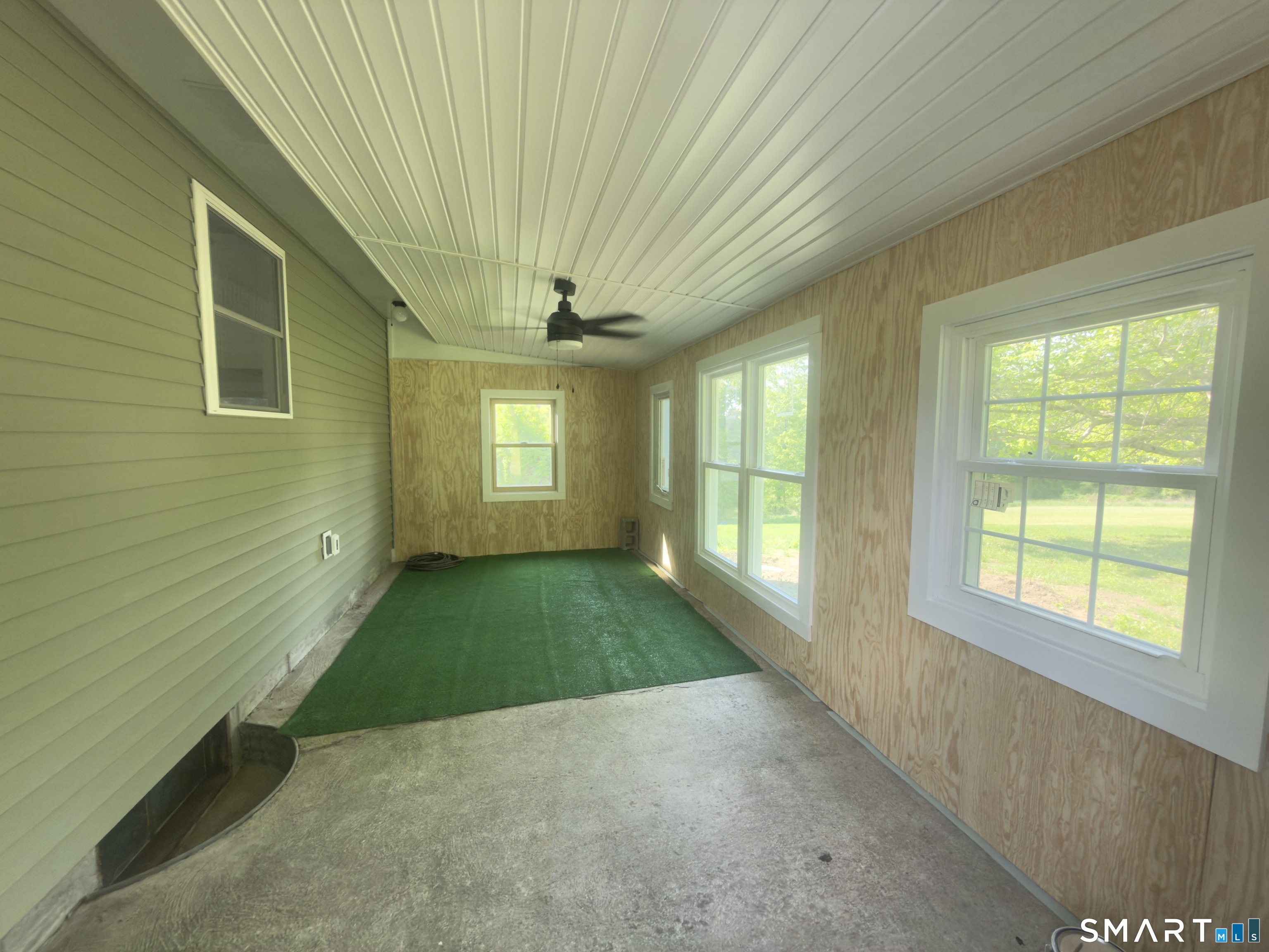 44 Polly Avenue Killingly, CT 06239 - Photo 4 of 22 a view of an empty room with a window