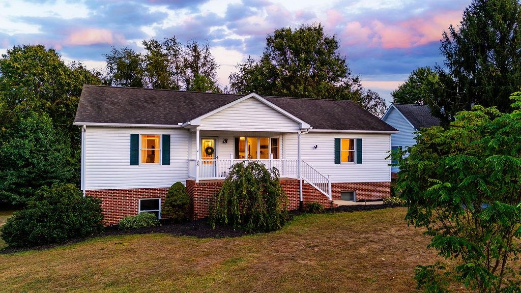 88 Yarmouth Road Stuarts Draft, VA 24477 - Photo 1 of 59 a house that has a tree in front of it